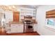 Bright and modern kitchen featuring stainless steel appliances and ample storage space and granite counters at 624 19Th W St, Bradenton, FL 34205