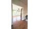 Inviting living room with hardwood floors and bright light coming through the windows at 624 19Th W St, Bradenton, FL 34205