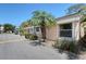 Charming exterior of a home featuring a well-maintained lawn and attractive landscaping, with a clear blue sky overhead at 6240 7Th W Ave # 6240, Bradenton, FL 34209