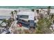 Modern beach house showcasing ocean views and contemporary design with floor to ceiling windows at 6603 Gulfside Rd, Longboat Key, FL 34228
