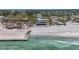 Beachfront neighborhood featuring home with contemporary design, and elevated construction at 6603 Gulfside Rd, Longboat Key, FL 34228