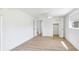 Spacious and bright bedroom with modern floors, closet and a serene view of the outside at 6628 Keystone Dr, Sarasota, FL 34231
