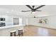 Bright, open living space with updated floors, modern kitchen and stainless steel appliances at 6628 Keystone Dr, Sarasota, FL 34231