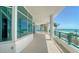 Condo balcony featuring ocean view and tiled floor at 675 Longboat Club Rd # 23A, Longboat Key, FL 34228