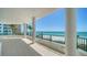 Large condo balcony with ocean view and glass railings at 675 Longboat Club Rd # 23A, Longboat Key, FL 34228