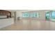 Bright, open-concept living area with tile flooring and a view of the water at 675 Longboat Club Rd # 23A, Longboat Key, FL 34228
