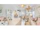 Open-concept living space with stylish decor and plenty of natural light at 6770 Fairway Gardens Dr, Bradenton, FL 34203