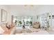 Spacious living room with large windows offering ample natural light at 6770 Fairway Gardens Dr, Bradenton, FL 34203