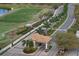Aerial view of gated entrance, golf course, and meticulously landscaped grounds at 7538 Camden Harbour Dr, Bradenton, FL 34212