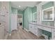 Bathroom with double vanity, granite countertops, light-up mirrors, a shower, and water closet at 7538 Camden Harbour Dr, Bradenton, FL 34212