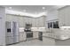 Spacious kitchen with stainless steel appliances, granite countertops, and ample cabinet space at 7538 Camden Harbour Dr, Bradenton, FL 34212