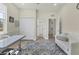 Office space with a large desk, a sofa, and plenty of natural light at 7538 Camden Harbour Dr, Bradenton, FL 34212
