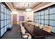 Formal conference room features a large table, comfortable seating, and elegant lighting, perfect for meetings and presentations at 7803 Grand Estuary Trl # 102, Bradenton, FL 34212