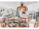 Tastefully decorated dining table within an open layout with water views at 7803 Grand Estuary Trl # 102, Bradenton, FL 34212