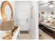 Welcoming entryway with stylish decor leading to a bedroom with ceiling fan at 7803 Grand Estuary Trl # 102, Bradenton, FL 34212