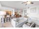 Open-concept living area with a seamless flow to the kitchen and dining, offering a spacious atmosphere at 7803 Grand Estuary Trl # 102, Bradenton, FL 34212