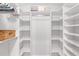 Spacious walk-in closet with custom shelving at 7803 Grand Estuary Trl # 102, Bradenton, FL 34212