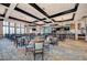 Spacious dining area in the community clubhouse, featuring lots of light and views at 8304 Grand Estuary Trl # 104, Bradenton, FL 34212
