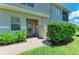 Inviting home exterior with a brick pathway leading to the front door at 8304 Grand Estuary Trl # 104, Bradenton, FL 34212
