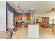 Modern kitchen with stainless steel appliances and a granite countertop bar area at 8304 Grand Estuary Trl # 104, Bradenton, FL 34212