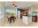 Cozy kitchen nook with natural light and outdoor view, complete with ceiling fan at 8304 Grand Estuary Trl # 104, Bradenton, FL 34212