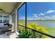 Enjoy picturesque views from the screened-in lanai, perfect for outdoor relaxation by the water at 8304 Grand Estuary Trl # 104, Bradenton, FL 34212