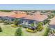 Backyards include screened patios, pools, and green space in this aerial shot at 7036 Highgate Ln, Lakewood Ranch, FL 34202