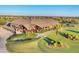 Panoramic aerial view of the community clubhouse featuring scenic landscaping and golf course, creating an inviting atmosphere at 7036 Highgate Ln, Lakewood Ranch, FL 34202