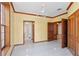 This bedroom features bright walls, tile flooring, and wooden trim at 1577 Alexander Rd, Belleair, FL 33756