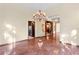 Inviting foyer with decorative flooring, a chandelier, and access to other rooms at 1577 Alexander Rd, Belleair, FL 33756