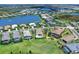 Aerial view of homes in a lakeside residential community with a white circle drawn around one property at 17114 Verona Pl, Lakewood Ranch, FL 34202
