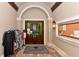Lakewood National community entrance with a barrel arched ceiling, tile floors, double doors and a Lakewood National door mat at 17118 Vardon Ter # 307, Bradenton, FL 34211