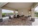 Community pool pavilion featuring dining tables and outdoor grills, perfect for gatherings at 17118 Vardon Ter # 307, Bradenton, FL 34211