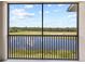 Scenic view of golf course and lake from the screened-in balcony at 17902 Gawthrop Dr # 401, Bradenton, FL 34211