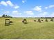 A well-maintained golf course driving range shows tee boxes and manicured grass at 17902 Gawthrop Dr # 401, Bradenton, FL 34211