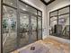 Well-equipped gym with various exercise machines, visible through large glass doors, promoting a healthy lifestyle at 17902 Gawthrop Dr # 401, Bradenton, FL 34211