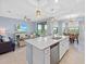 A stylish kitchen island that transitions to the cozy living area at 17902 Gawthrop Dr # 401, Bradenton, FL 34211