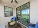 Inviting outdoor patio with comfortable seating and a stunning golf course view at 17902 Gawthrop Dr # 401, Bradenton, FL 34211