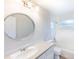 Bright bathroom featuring a tub and shower combo and an oval mirror at 1823 8Th E Ave, Bradenton, FL 34208