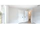 Bedroom featuring neutral paint and two doors at 1823 8Th E Ave, Bradenton, FL 34208