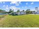 This home features a well-maintained backyard, verdant lawn, and enclosed porch at 2005 47Th Street W Ct, Bradenton, FL 34209