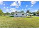 Charming home featuring a well-maintained backyard and verdant lawn at 2005 47Th Street W Ct, Bradenton, FL 34209
