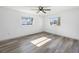 Bright bedroom with hardwood floors and natural light from two windows at 2005 47Th Street W Ct, Bradenton, FL 34209