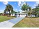 Inviting single-story home with a lush front yard and driveway leading to a one-car garage, perfect for suburban living at 2005 47Th Street W Ct, Bradenton, FL 34209