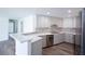 Modern kitchen with an open design features stainless steel appliances, and sleek countertops, creating a functional area at 2005 47Th Street W Ct, Bradenton, FL 34209