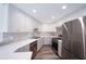 Updated kitchen featuring stainless steel appliances, sleek countertops, and ample storage, combining style with functionality at 2005 47Th Street W Ct, Bradenton, FL 34209