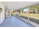 Relaxing enclosed patio offering a seamless transition to the outdoors and natural light at 2005 47Th Street W Ct, Bradenton, FL 34209