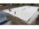 Outdoor sand volleyball court with nets, poles, and an American flag in a community setting at 2005 47Th Street W Ct, Bradenton, FL 34209