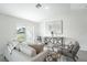 Comfortable living room with sliding glass doors and a modern decor at 21077 Baffin Ave, Port Charlotte, FL 33954