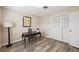 Flex bedroom with stylish desk, natural light, and ample storage space, perfect for a home office at 217 Giotto Dr, Nokomis, FL 34275